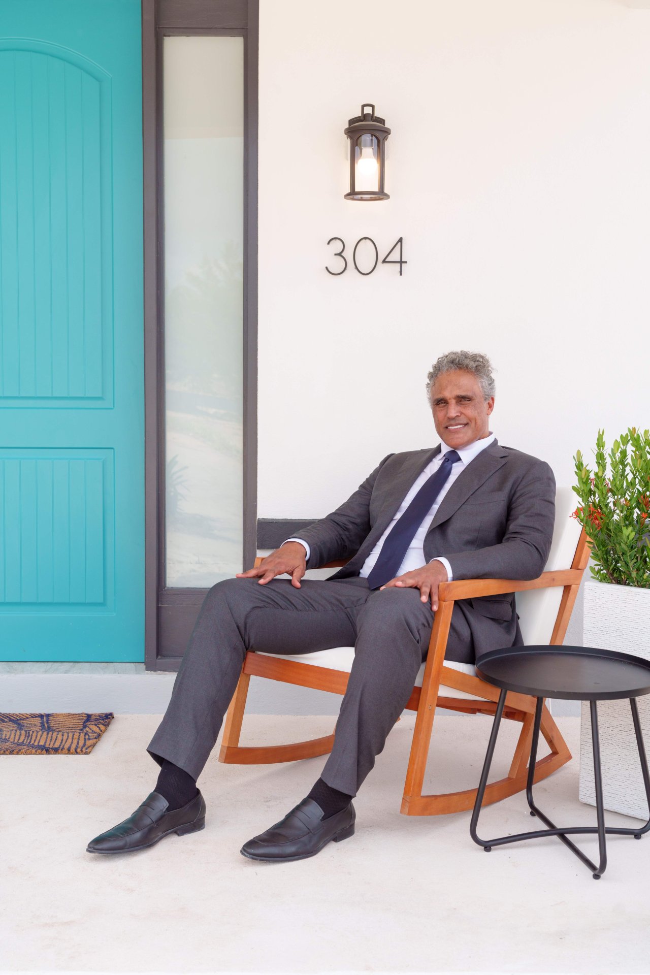 Rick Fox sat outside the Partanna Home.