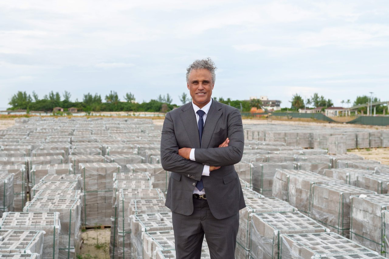 Rick Fox stood next to Partanna block products.